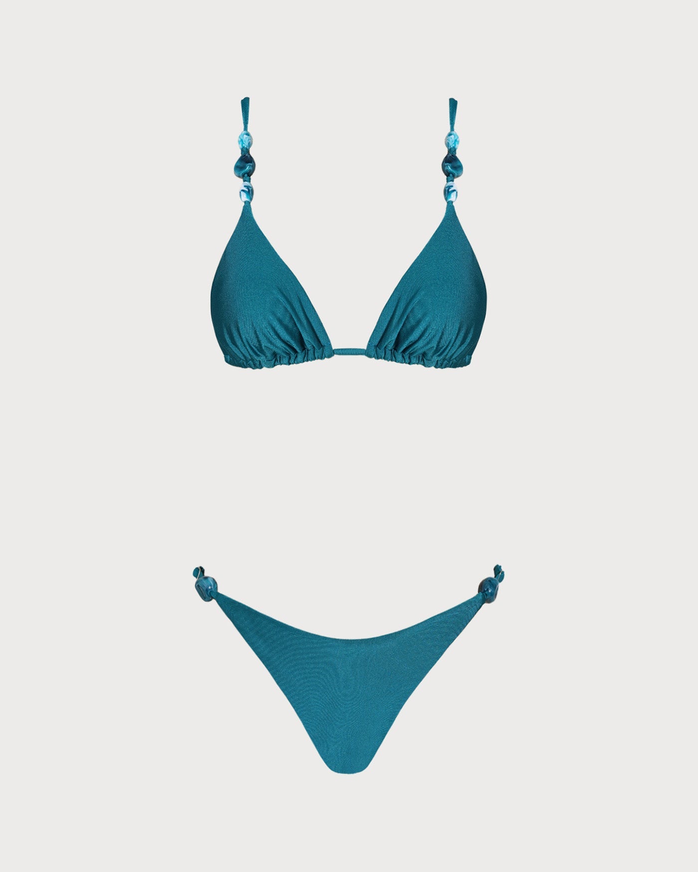 Conjunto de bikini triangular con fruncidos en color turquesa