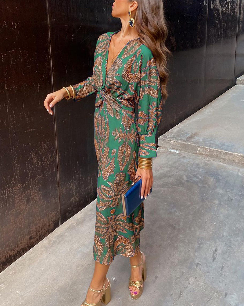 Vestido midi estampado detalle tela