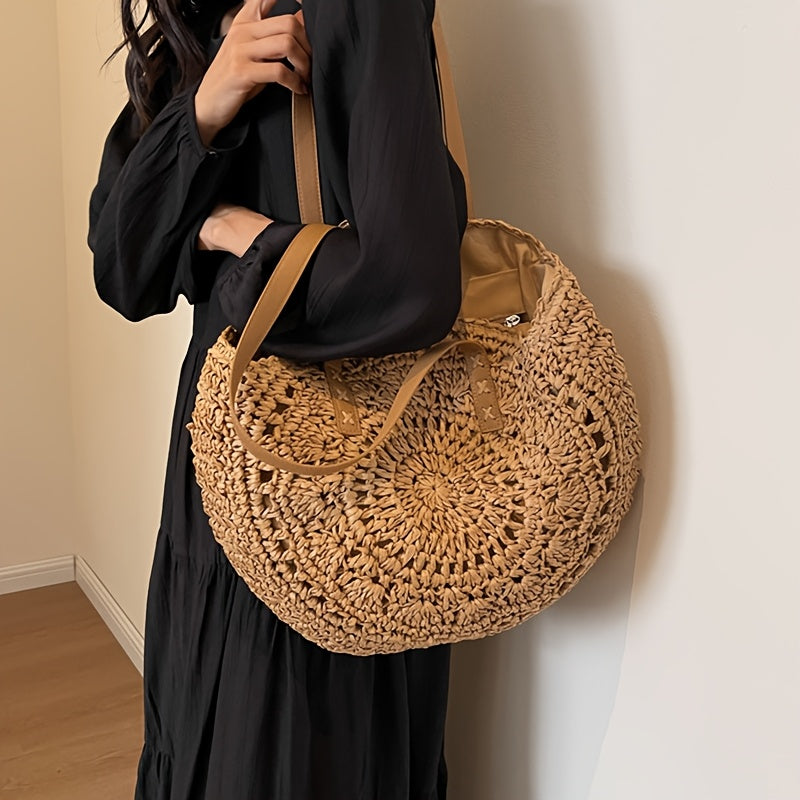 Lola | Bolso redondo de paja trenzada con motivo — cognac