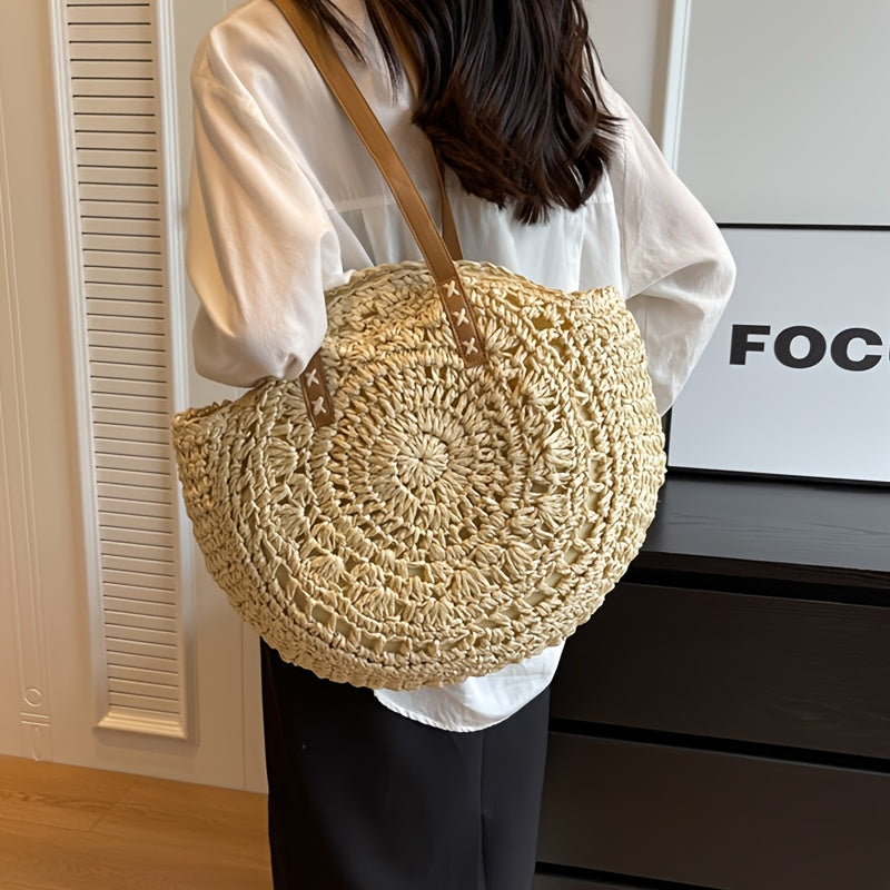 Luigia | Bolso redondo de paja trenzada con motivo — beige natural