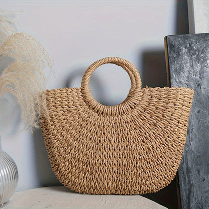 Serenella | Bolso en media luna de paja trenzada color cognac