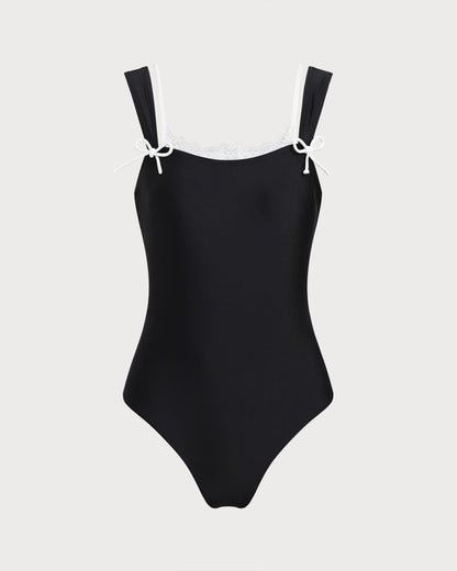 Bañador de una pieza negro con encaje en contraste